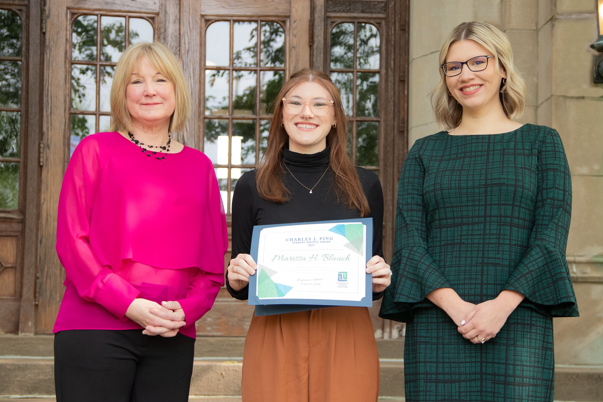 Marissa Blauch with her award, Provost Dugan, and Dr. Bennett