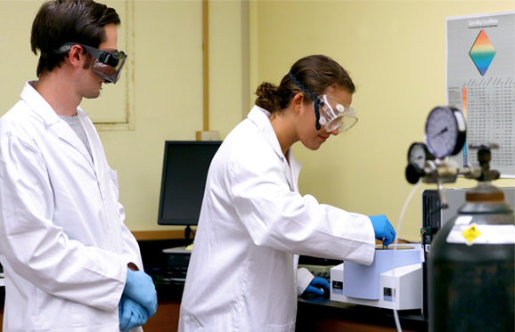 chemistry professor with student