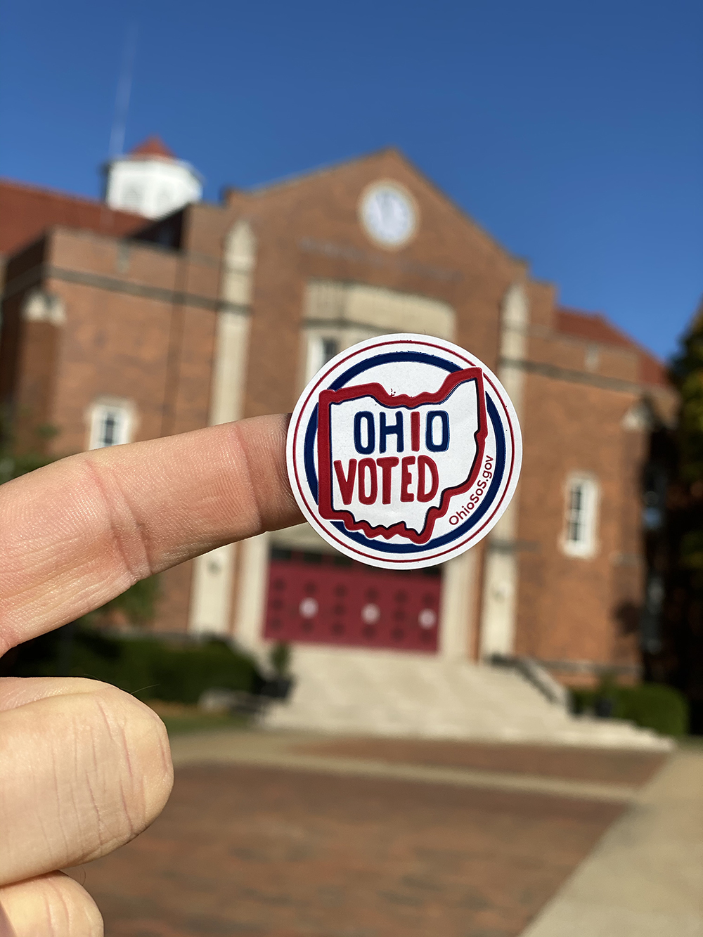 voting sticker in front of John Glenn Gym