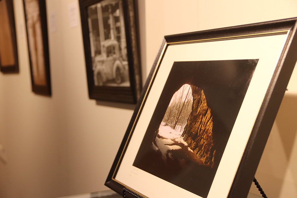 photo of a photo that is on display at the art exhibit