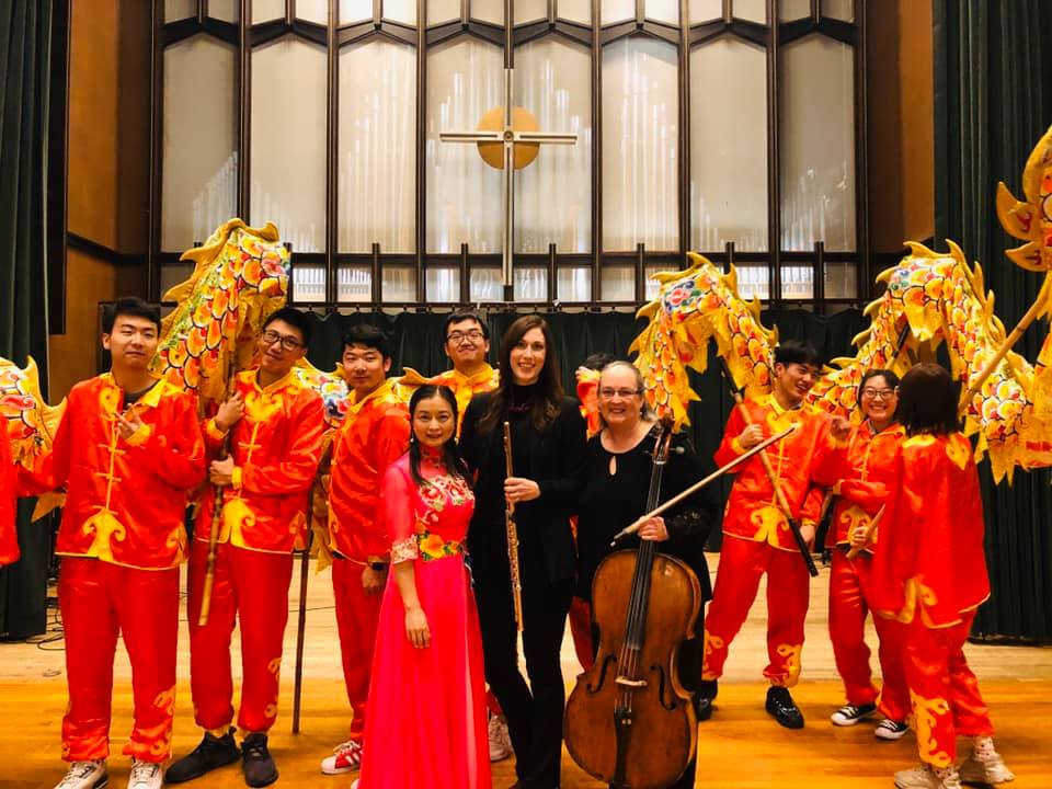 Rhythm of the Dragon performers dressed in traditional chinese attire