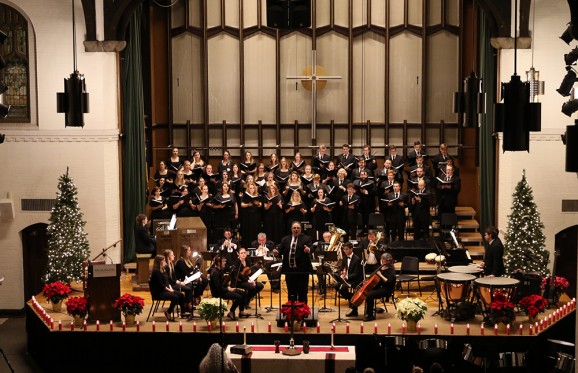 balcony view of the concert choir and musical ensemble on stage in Brown Chapel at the chrismas festival