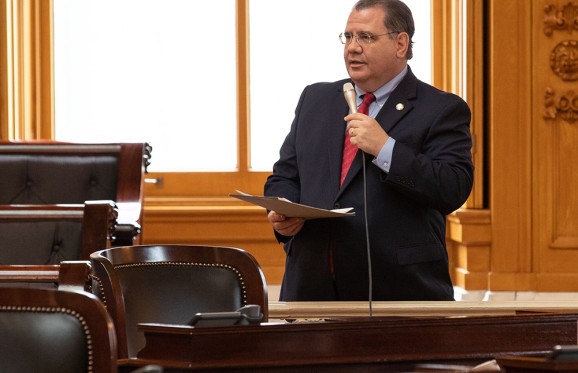tim schaffer speaking holding a microphone