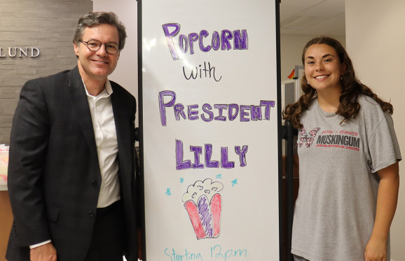 President Lilly having popcorn with the MU community