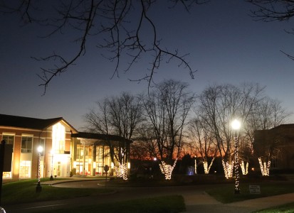 christmas lights lit up around the Library