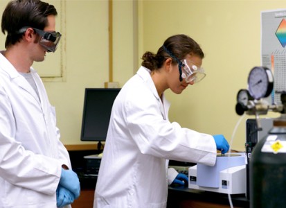 chemistry professor with student