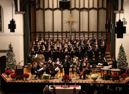 balcony view of the concert choir and musical ensemble on stage in Brown Chapel at the chrismas festival