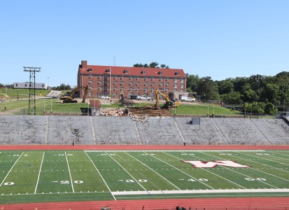 demolition of the pressbox kicking off the HWC project construction