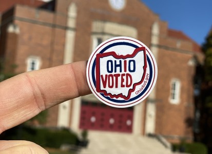 voting sticker in front of John Glenn Gym