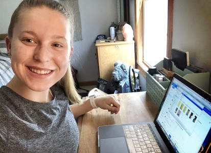 Muskingum student learning remotely at their home desk with laptop open