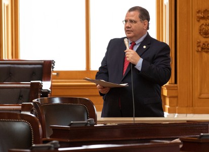 tim schaffer speaking holding a microphone