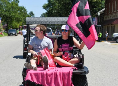 Gary Kinney and Grace Johnson on float