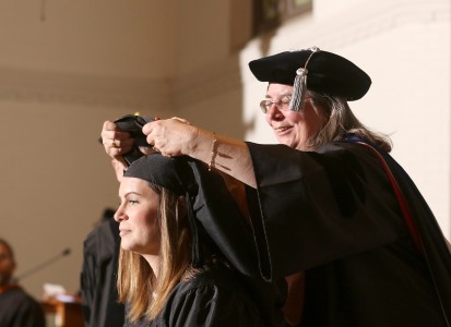 Student being hooded