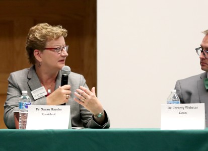 President Susan Hasseler talking on a panel