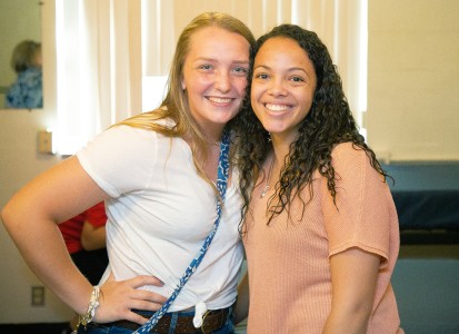 Two first-year students smiling