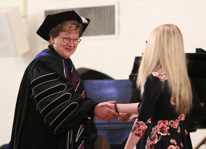 President Hasseler and student