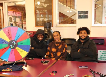 African American Students hosting a BHM trivia Table in the Bait shop on campus during Lunch Hour