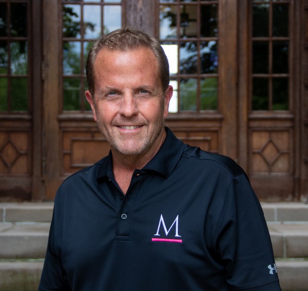 Image of Gary Atkins in front of Montgomery Hall